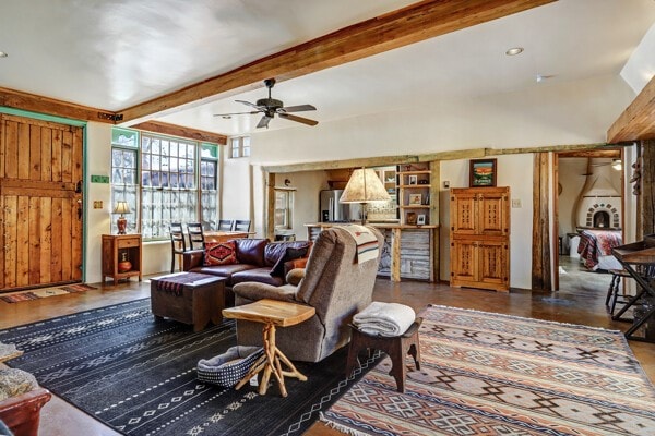 220 Irvine Unit B, Santa Fe, NM 87501 - living area with ceiling fan, beam ceiling, and wood finished floors