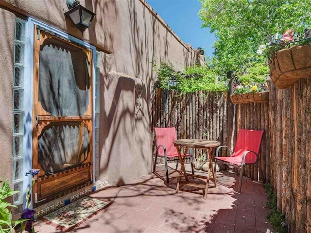 view of patio with fence