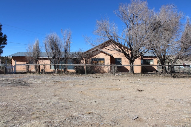 exterior space featuring a fenced front yard