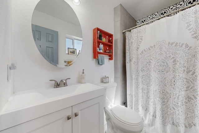 full bathroom with toilet, shower / tub combo with curtain, and vanity