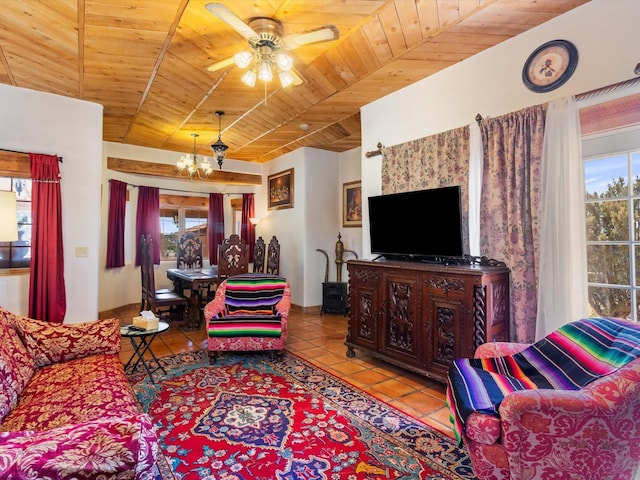 tiled living area with wood ceiling and ceiling fan with notable chandelier