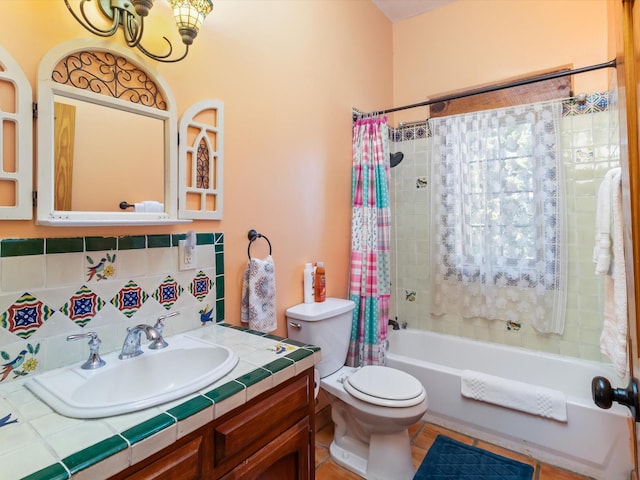 full bathroom with shower / tub combo, vanity, toilet, and tasteful backsplash