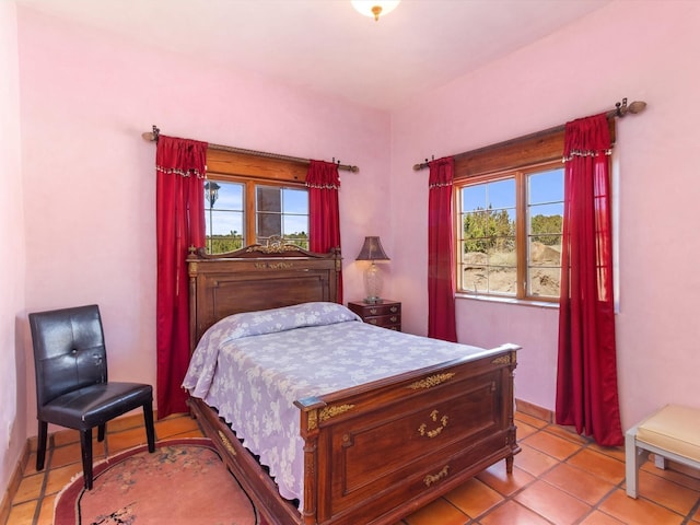 bedroom featuring light tile patterned floors