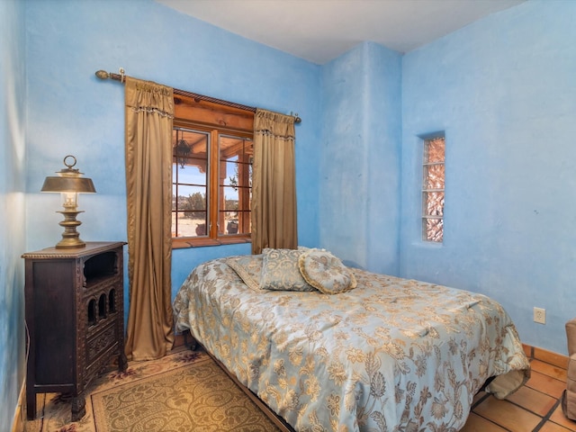 bedroom featuring tile patterned floors