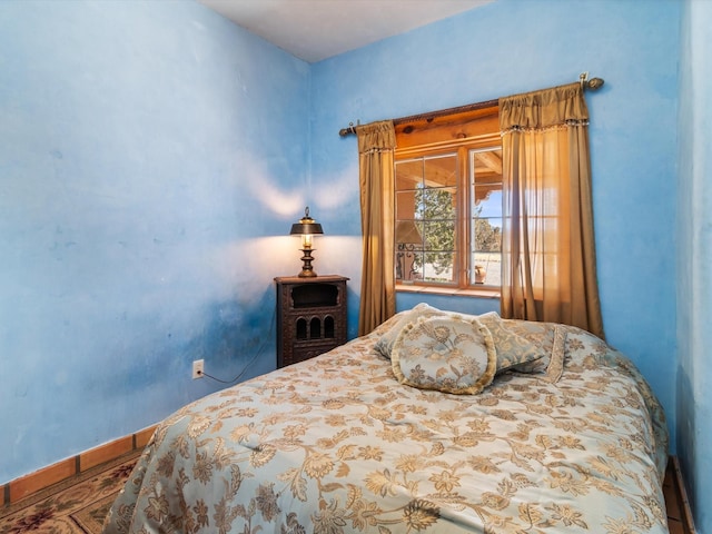 bedroom with baseboards