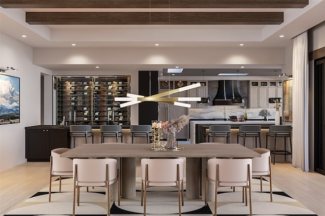 interior space with light wood-type flooring, beam ceiling, and recessed lighting