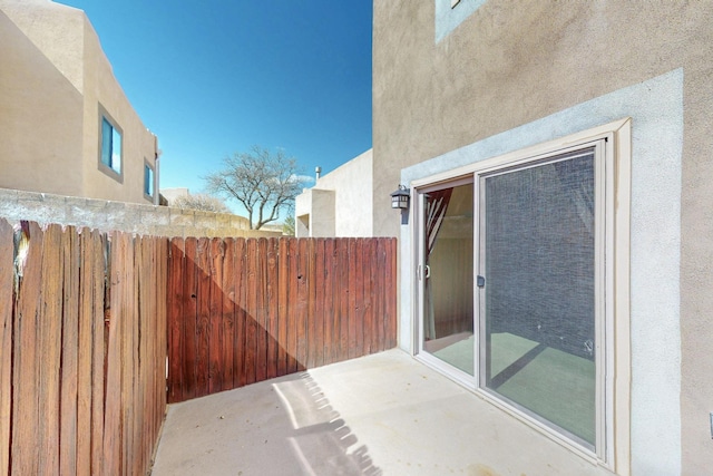 view of patio / terrace with fence