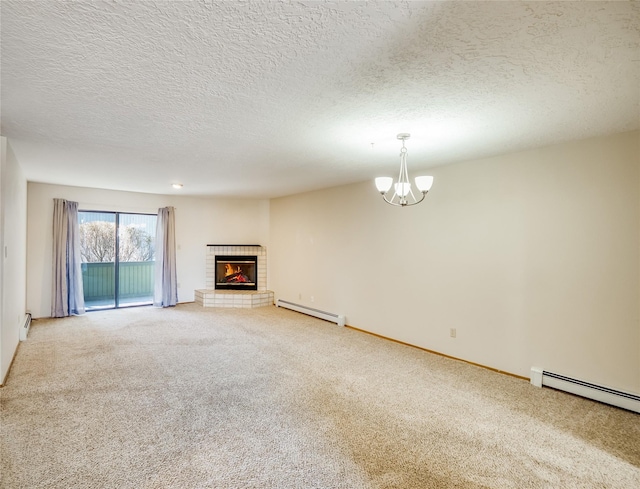 unfurnished living room with a fireplace, a baseboard radiator, baseboard heating, carpet flooring, and a chandelier