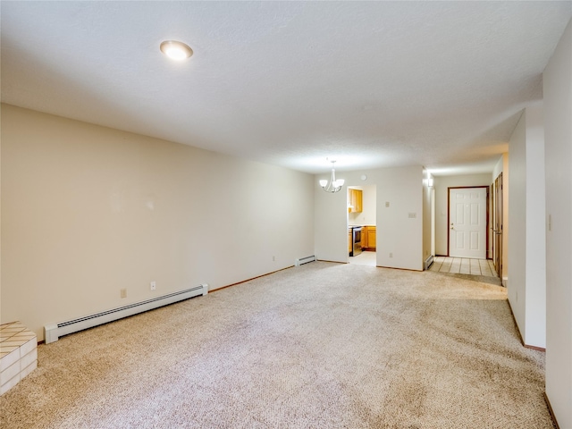 unfurnished room featuring a chandelier, baseboards, light colored carpet, and baseboard heating