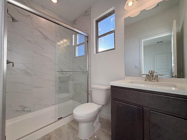 full bathroom with marble finish floor, a marble finish shower, visible vents, toilet, and vanity