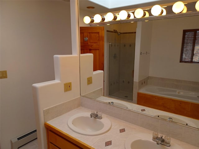 bathroom with a baseboard radiator, a sink, a bath, double vanity, and a stall shower