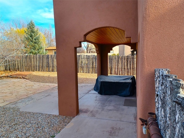 view of patio with fence