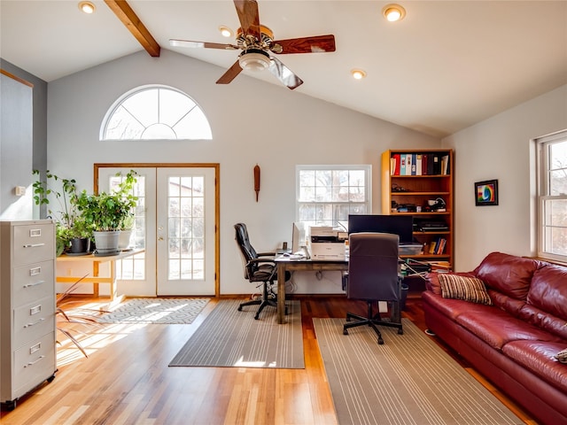 home office with a wealth of natural light, french doors, and wood finished floors