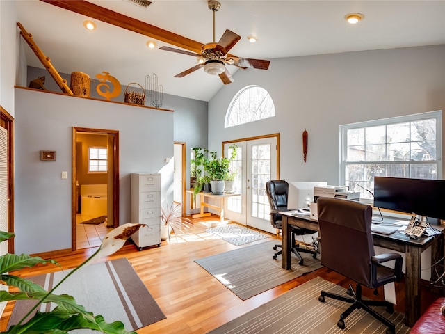 office space with high vaulted ceiling, light wood-style flooring, recessed lighting, visible vents, and french doors