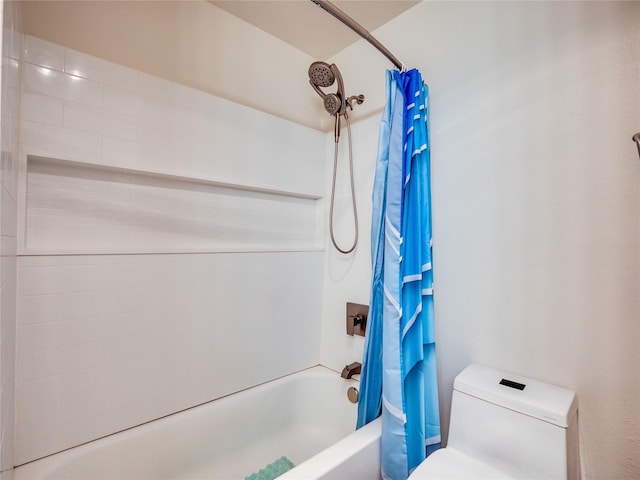 bathroom with shower / bathtub combination with curtain and toilet