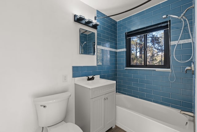 full bath with shower / washtub combination, vanity, and toilet