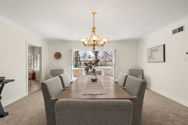 dining area with light carpet, baseboards, visible vents, ornamental molding, and a chandelier