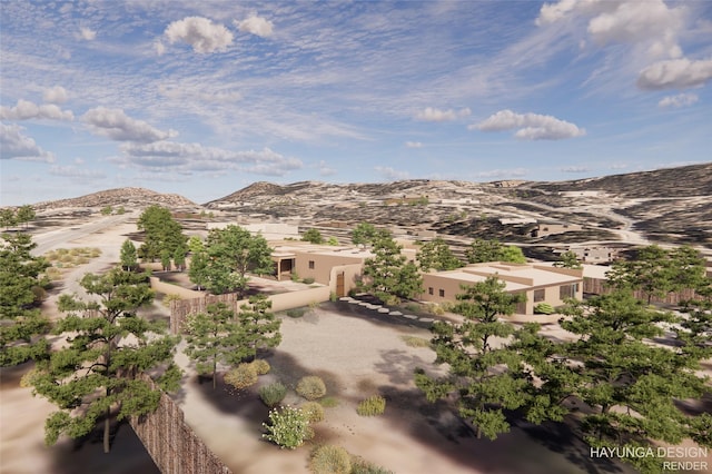 birds eye view of property with a mountain view