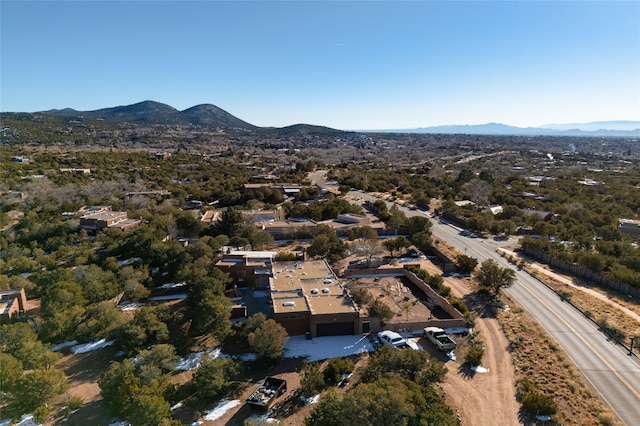 birds eye view of property featuring a mountain view