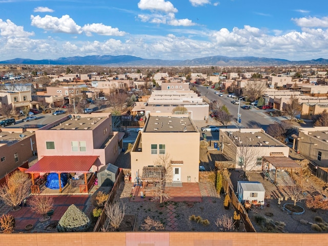 bird's eye view featuring a residential view and a mountain view