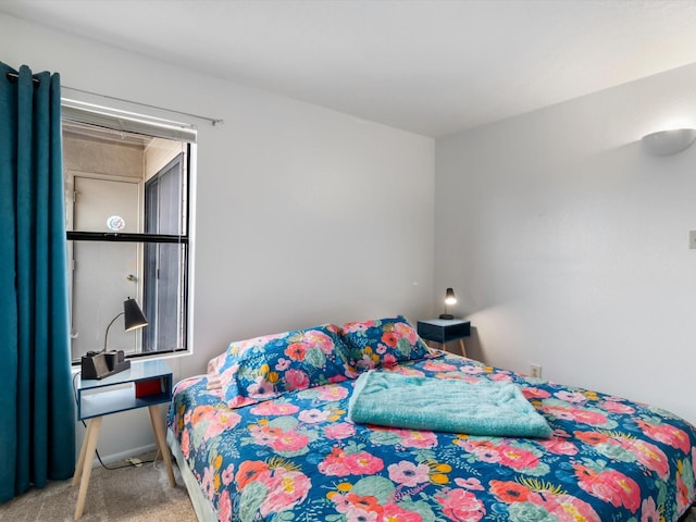 941 Calle Mejia Unit 715, Santa Fe, NM 87501 - carpeted bedroom featuring baseboards