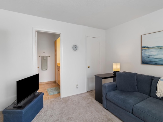 living room featuring light carpet and light tile patterned floors