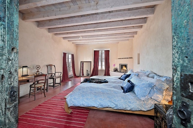 bedroom with beam ceiling