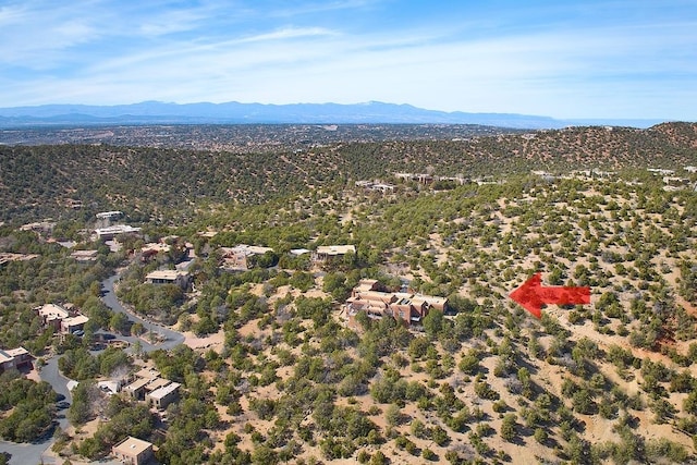 drone / aerial view featuring a mountain view