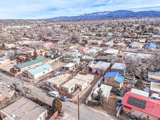 drone / aerial view featuring a mountain view