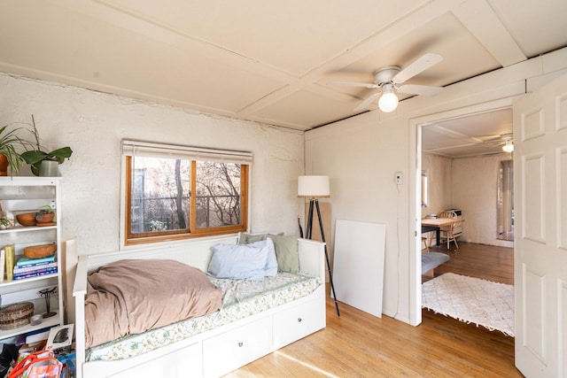 interior space featuring a ceiling fan and wood finished floors