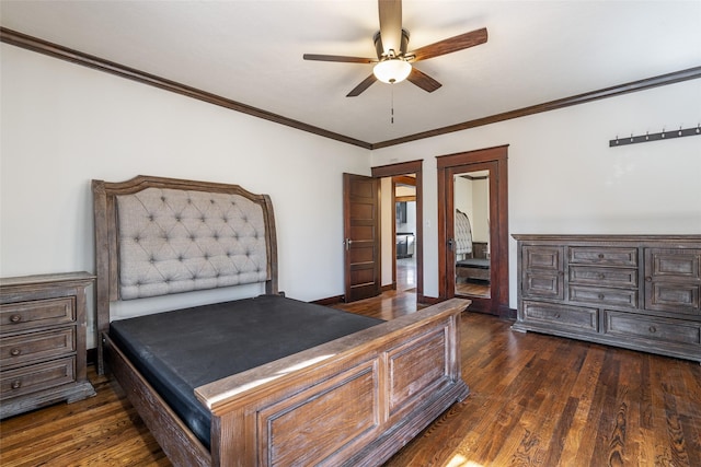 bedroom with dark wood-style floors, crown molding, and a ceiling fan