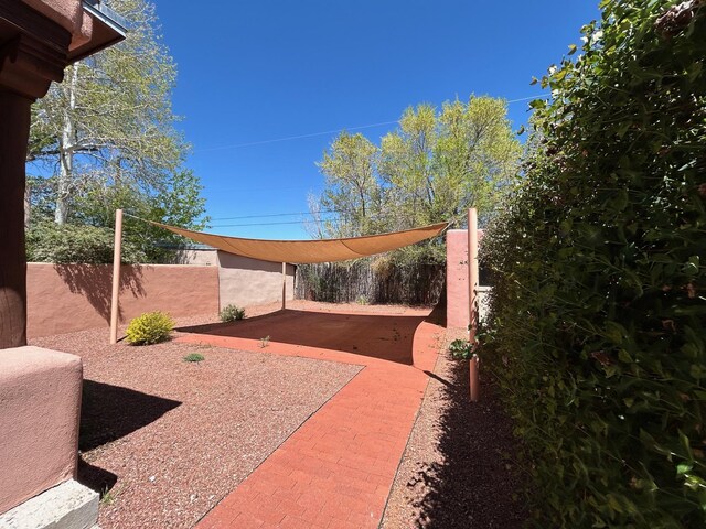view of outbuilding with fence