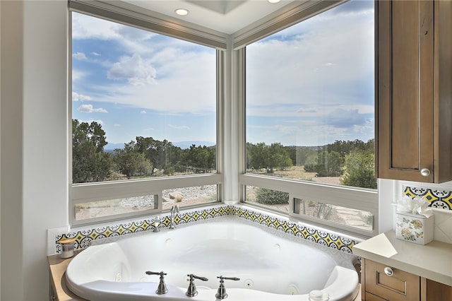 bathroom with a jetted tub