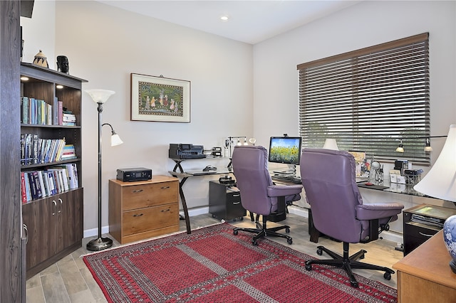 office with recessed lighting, baseboards, and wood finished floors