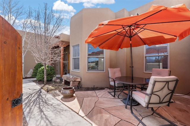 view of patio with outdoor dining area