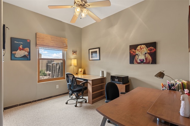 home office featuring baseboards, carpet floors, and ceiling fan