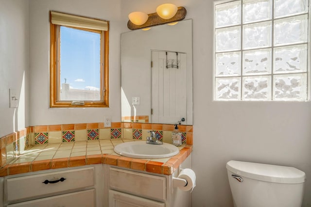half bath with toilet and vanity