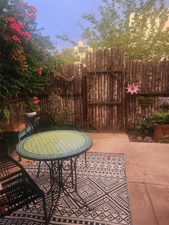 view of patio with fence