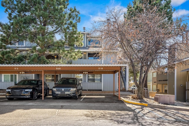 exterior space featuring covered parking