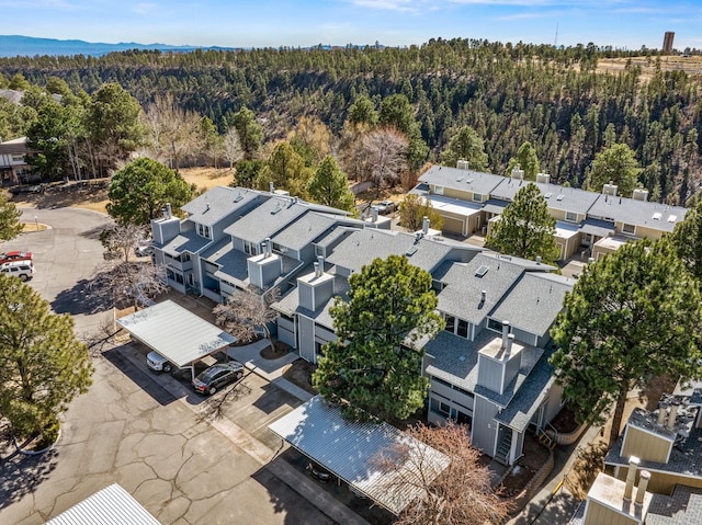 bird's eye view with a residential view and a view of trees