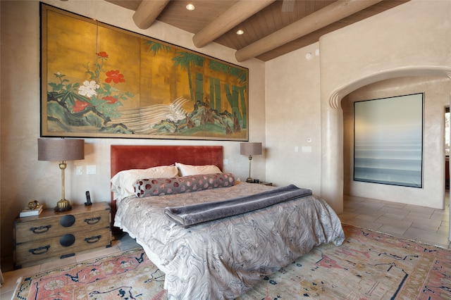 bedroom with recessed lighting, beamed ceiling, and wood ceiling