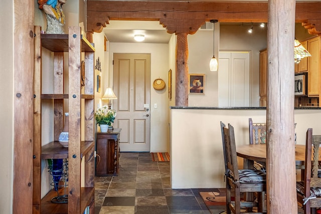 interior space featuring visible vents and stone finish floor