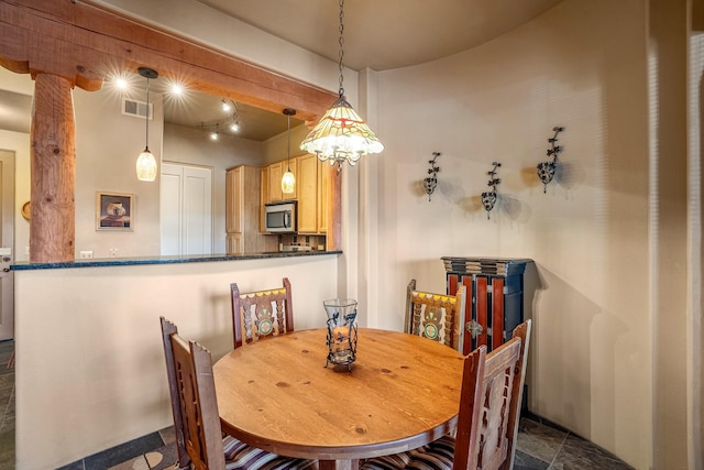 dining room with visible vents