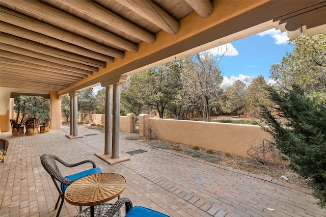 view of patio featuring outdoor dining area and a fenced backyard