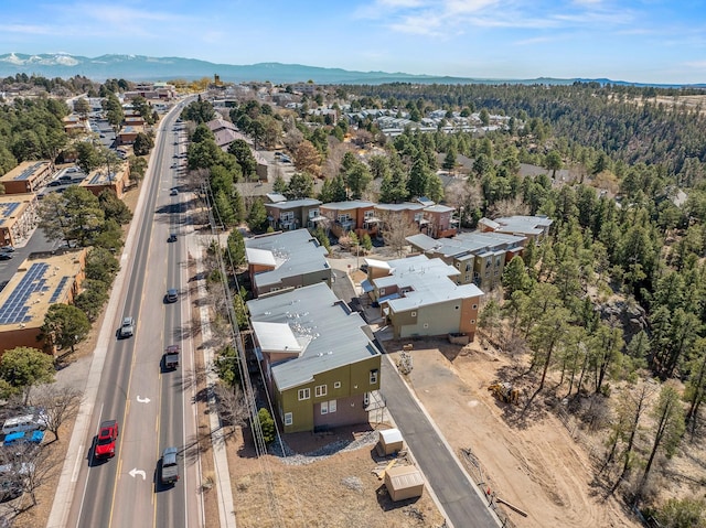 drone / aerial view featuring a mountain view and a residential view