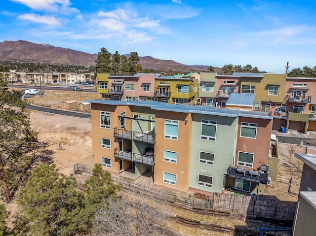 view of building exterior with a mountain view