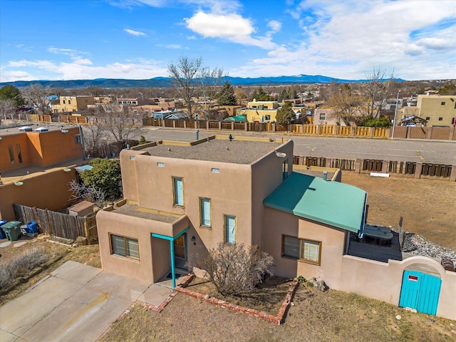 drone / aerial view with a mountain view and a residential view