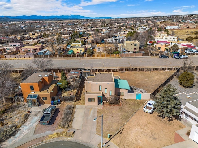 bird's eye view with a mountain view and a residential view