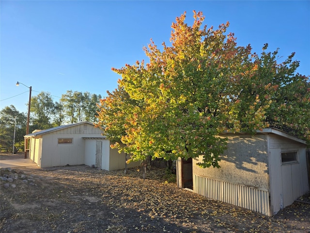 exterior space with an outbuilding