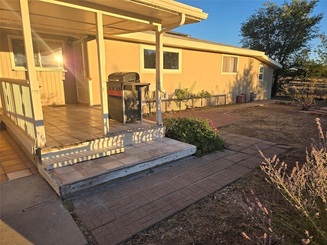 exterior space featuring stucco siding